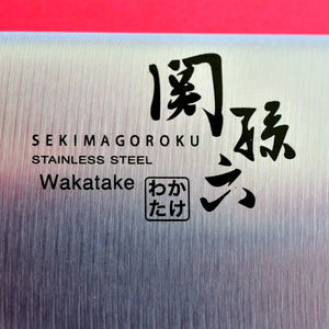 Close-up Chef's knife KAI Gyuto Seki Magoroku WAKATAKE kitchen butcher Japan